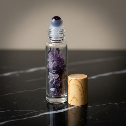Close-up shot of the Amethyst Crystal Roller Bottle, 10ml, captured with a professional studio HDR lighting setup, emphasizing the translucency and natural texture of the amethyst gemstone. The camera is positioned at a slight angle with a macro lens, focu