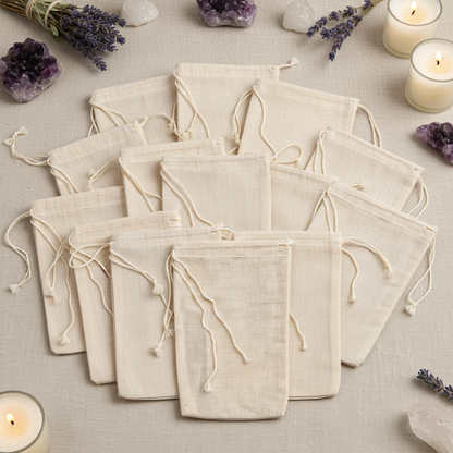 Create a highly detailed, professional studio image of a set of 500 cotton tea bags, measuring 3' x 5', arranged in an elegant, flat lay composition on a natural linen cloth backdrop. Use softbox lighting with gentle diffusion to accentuate the texture of 