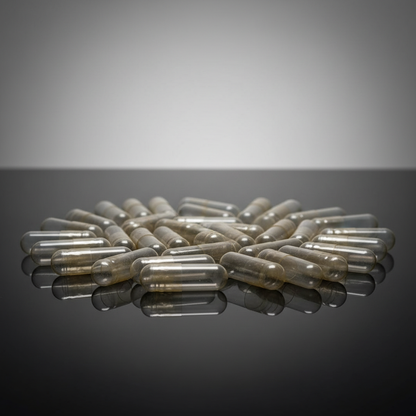 A highly detailed, professional studio photograph of a package of Size 0 Gelatin Capsules, 50 Pack, arranged neatly on a reflective black surface. The scene is illuminated with softbox lighting to create even, gentle highlights that enhance the transparenc