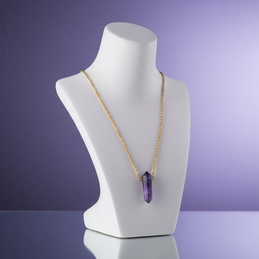 Present the Amethyst Double Terminated Necklace with Chain arranged on a minimalist, modern bust display in a softly lit studio environment. Employ HDR studio lighting to produce even, diffused illumination, emphasizing the rich, calming violet tones and t