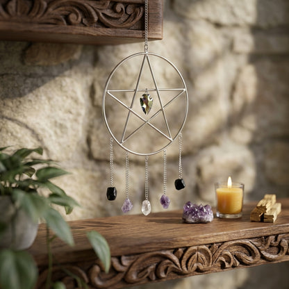 Small pentagram wall hanging on rustic stone wall in a sunlit garden, highlighting spiritual symbolism and delicate size.