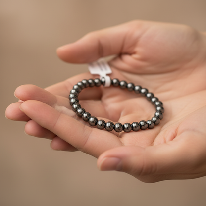 Hematite Bead Bracelet, 4mm Beads, held in hand