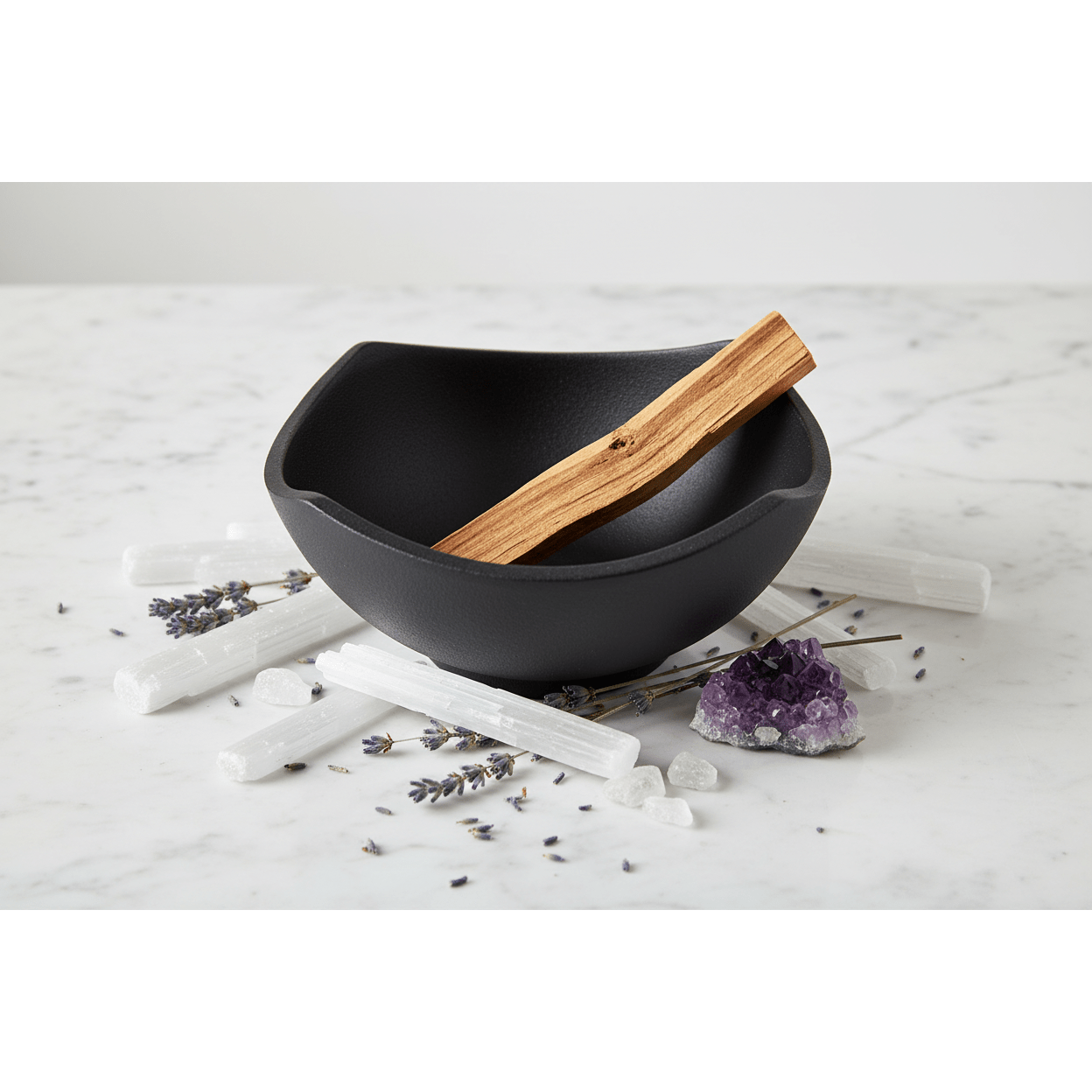 Cast Iron Cauldron Smudge Pot on white marble with palo santo and amethyst