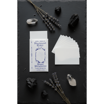 3" x 4" parchment paper sheets by Espiritu sliding out of matching envelope, flat lay with crystals and dried lavender on dark slate
