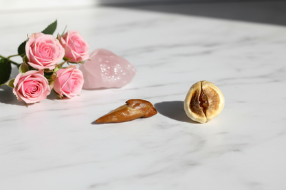 Adam and Eve Root pair on white marble with pink roses and rose quartz