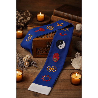 Blue and white interfaith minister's stole draped face-up over a wooden altar box at 45 degrees with dried flowers and crystal