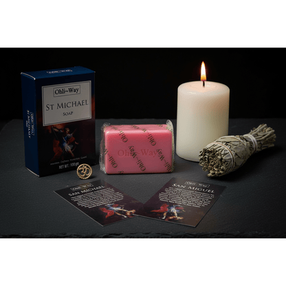St. Michael Protection Soap set with soap bar, box, prayer cards and Om charm on dark slate with candle and sage