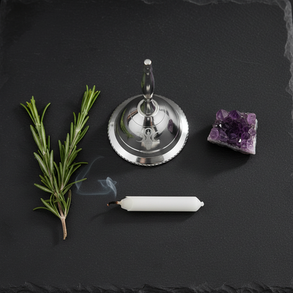 Earth Goddess Silver Altar Bell 2.5 inch flat lay with amethyst and rosemary on dark slate