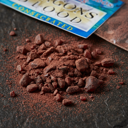 Macro close-up of Dragon's Blood Resin chunks and matte red-brown powder on dark stone surface