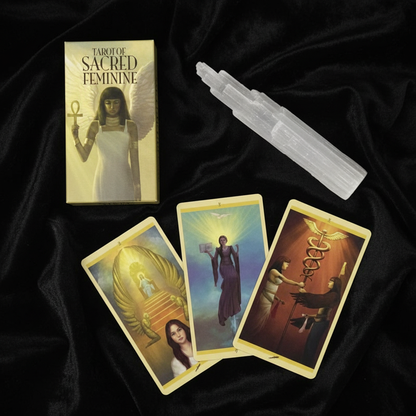 Tarot of Sacred Feminine deck and cards fanned on black velvet with selenite wand