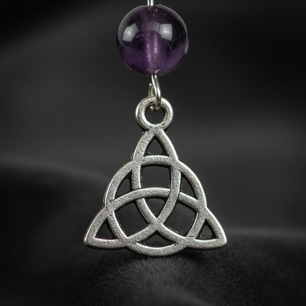 Amethyst Triquetra Earrings close-up detail of pewter knot and amethyst bead