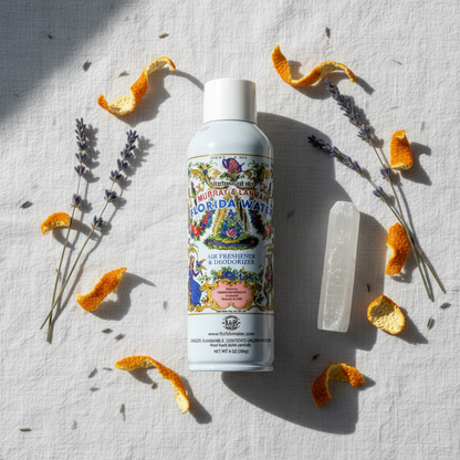 Florida Water Spray 8oz flat lay on white linen with selenite wand, dried lavender, and citrus peel
