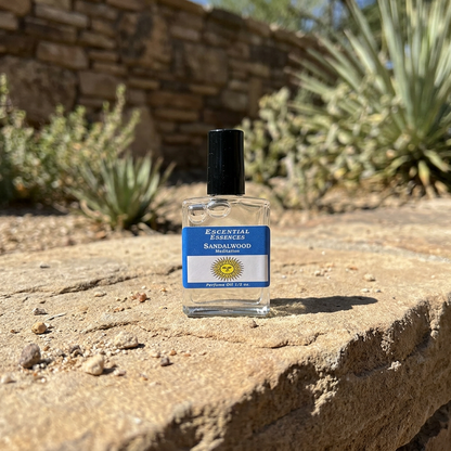 Ultra-realistic macro shot of tiny Summer Solstice essential oil bottle against textured background, emphasizing micro-engraved glass and clarity.