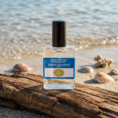 Full-body scene of Ocean Atlantis Perfume Oil bottle on a textured wooden surface in natural daylight.
