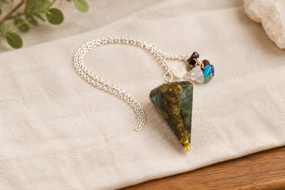 Olive-and-brown pendulum on wood