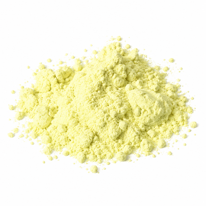 Overhead view of sulfur powder on white