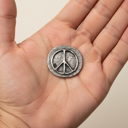 Peace Pocket Stone, held in hand
