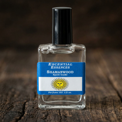 Close-up of Shamanwood Perfume Oil bottle showcasing sleek design and textured label on dark wooden surface with natural light.
