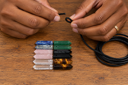 Smaller crystal points at a jewelry-making table