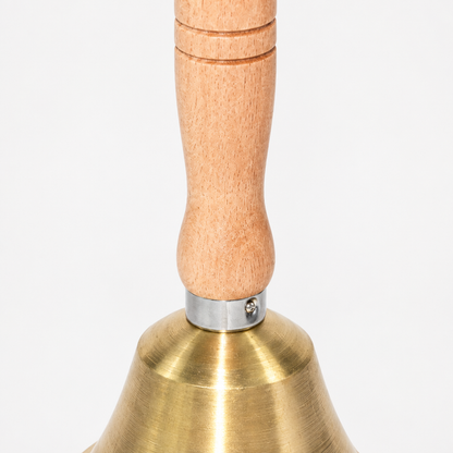 Wooden handle and brass bell detail